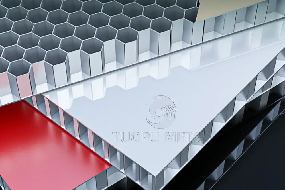 Close-up of pink aluminum honeycomb panel elevation demonstrating the fusion of innovative building materials, energy efficient design and architectural aesthetics. Cross-section of an aluminum honeycomb panel structure demonstrating its detailed honeycomb core design for enhanced stiffness and energy efficiency.