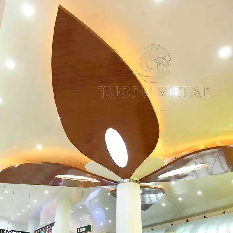 Aluminum veneer interior special-shaped ceiling with wood grain finish.