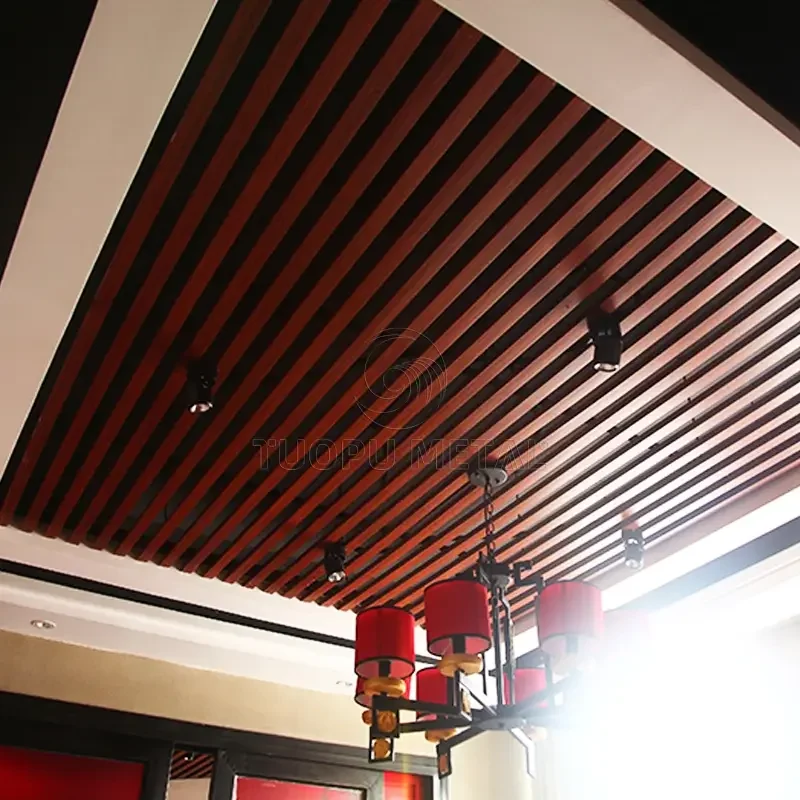 Ceiling with wood grain aluminum square tubes.