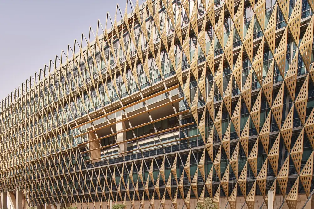 Custom perforated aluminum panels for the curtain wall of Kuwait University’s Life Sciences Faculty